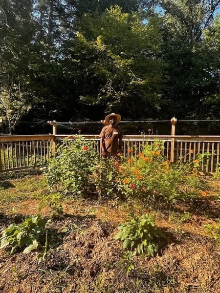 Vincent McKoy working the land at Pendergrast Farm